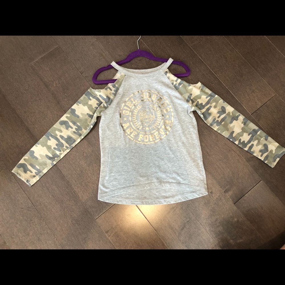 An adorable cold shoulder shirt for young girls.